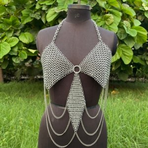 andmade chainmail halter top with draped chains, festival or cosplay armor top on dress form.